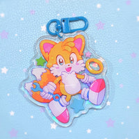 Tails Holographic Charm